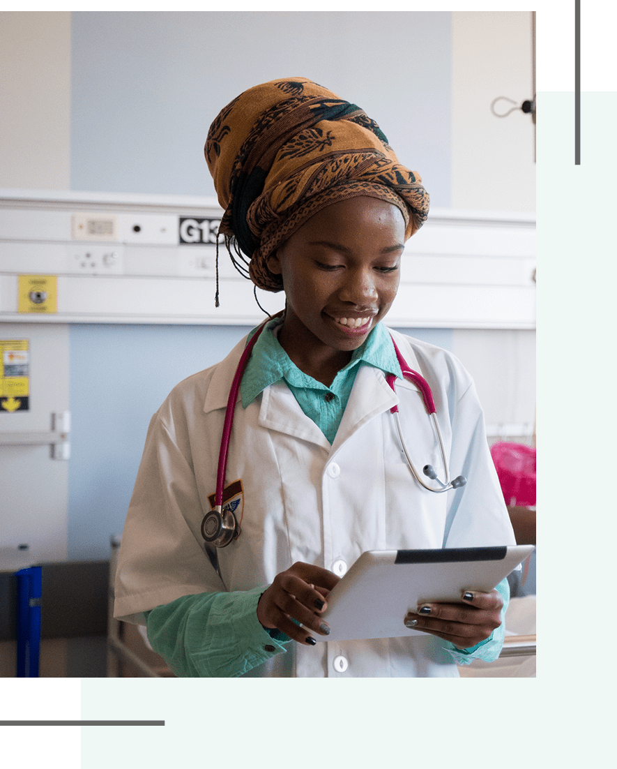 Medical worker checking information on device